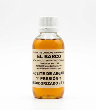 Frasco pequeño de vidrio transparente con tapa blanca, contiene aceite de argán dorado, etiquetado en color crema.