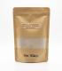 Bolsa marrón kraft resellable con 250 gramos de arcilla marrón natural, mostrando el contenido a través de una ventana transpare