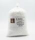 Bolsa transparente de 5 kg con gránulos blancos de Cloruro de Calcio Técnico al 77%.