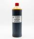 Botella cilíndrica de plástico de 1 litro con aceite de Neem virgen, color marrón oscuro y tapa roja.